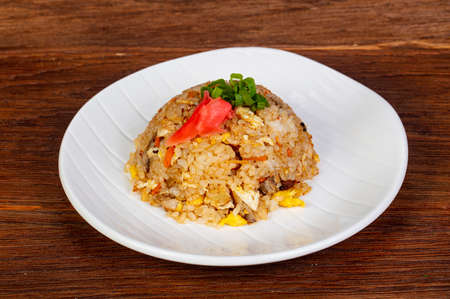 Stir fry rice with chicken and vegetablesの写真素材