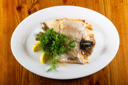 Stuffed trout with mushrooms and sauceの写真素材