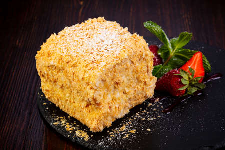 Napoleon layered cake served mint and strawberry