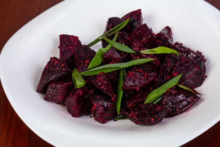 Beetroot salad with onion in the plate