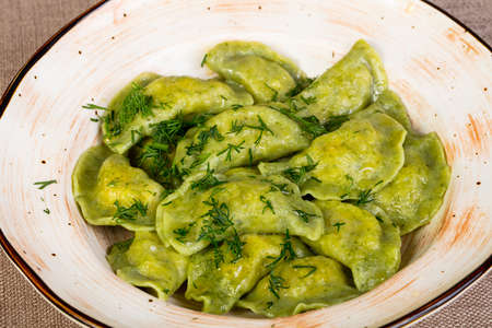 Russian traditional dumplings served herbsの写真素材