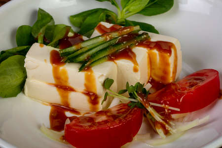 Japanese Tofu cheese with sauce and vegetables