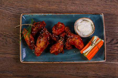 Chicken wings with dip sauceの写真素材