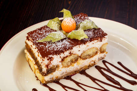 Famous Tiramisu cake served chokolate