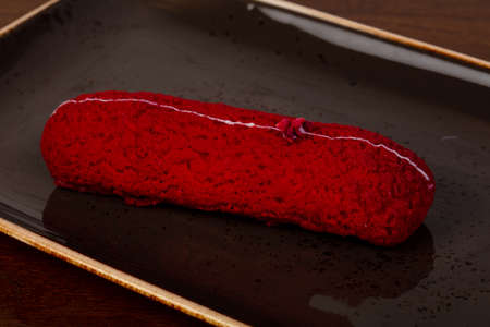 Tasty sweet Eclair with cream