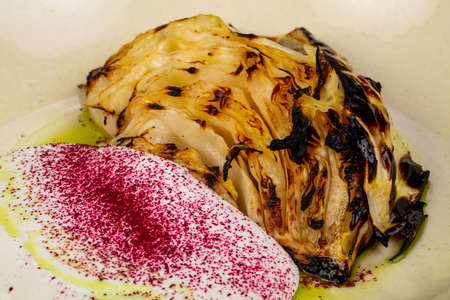 Grilled cabbage with sauce and spicesの写真素材