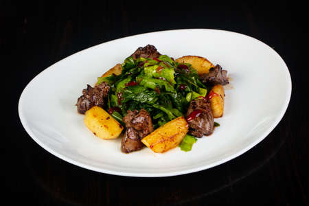 Salad with chicken liver and potatoの写真素材