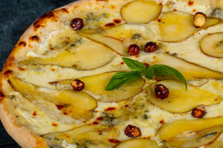Pizza with gorgonzola and sweet pearの写真素材