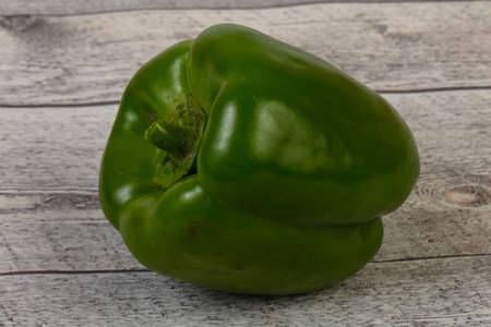 Ripe green bell pepper ower backgroundの写真素材