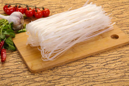 Raw rice noodles served cilantro leaves