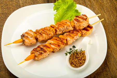 Grilled salmon skewer with dijon mustars sauceの写真素材
