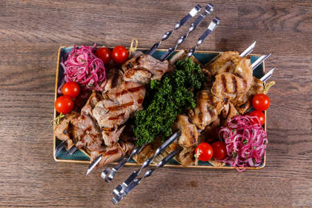 Grilled chicken and pork barbecueの写真素材