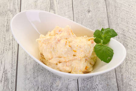 Curd with dry apricot served mint leavesの写真素材