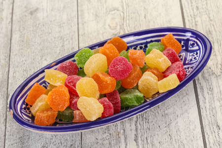 Sweet candied fruit heap in the bowl