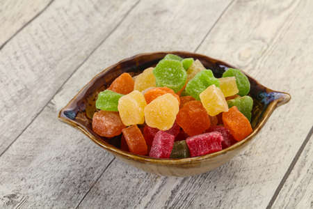 Sweet candied fruit heap in the bowl