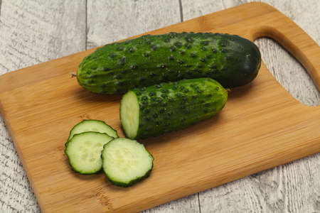 Ripe fresh green two cucumbers ready for veganの写真素材