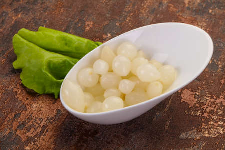 Pickled baby onion in the bowlの写真素材