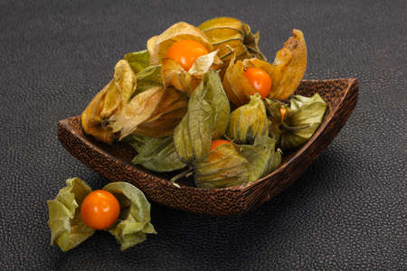 Ripe Winter cherry heap in the bowlの写真素材