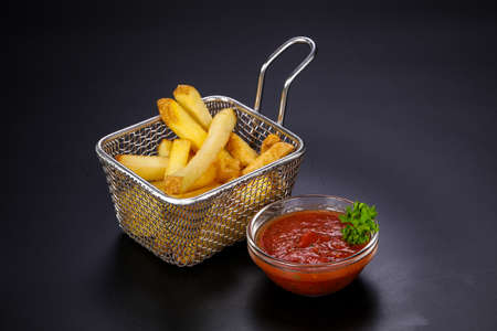 Homemade French fries potato with sauceの写真素材