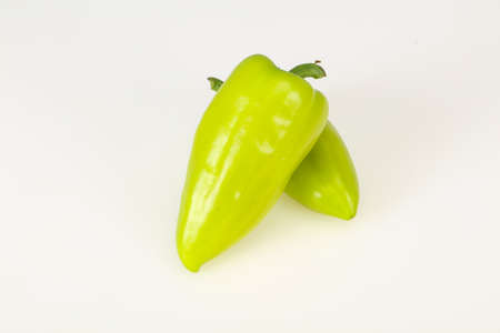 Sweet green bell pepper isolated on white backgroundの写真素材