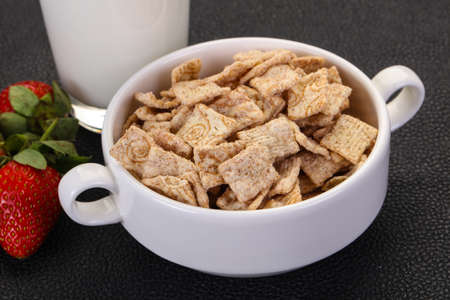 Wheat flakes for breakfast with milk and strawberry