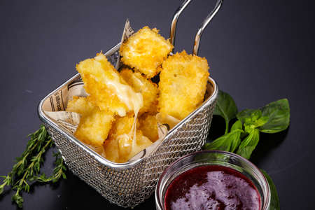 Fry camembert cheese with berry sauce