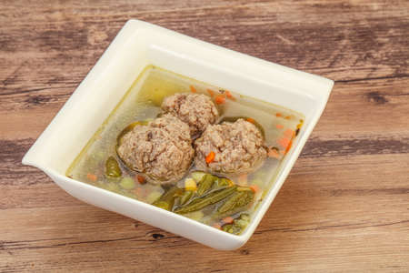 Soup with vegetables, spices and meat ballsの写真素材