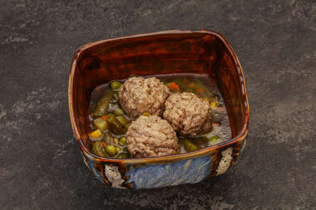 Soup with vegetables, spices and meat ballsの写真素材