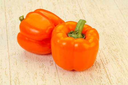 Two Orange sweet tasty Bell Pepperの写真素材