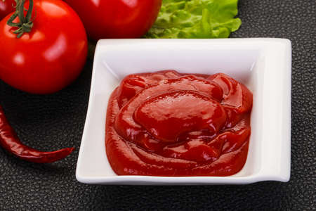 Tomato ketchup sauce served pepper and garlicの写真素材