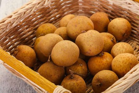 Tropical fruit longan in the basket