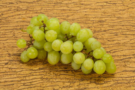 Sweet ripe fresh Green grape branchの写真素材