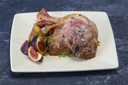 Roasted. duck. leg with plum, fig and apple