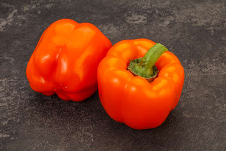 Two Orange sweet tasty Bell Pepperの写真素材