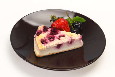 Cheesecake with cherry served strawberry and mintの写真素材