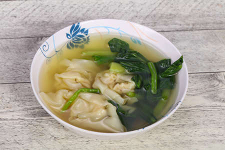 Asian traditional Wonton soup with herbs and spicesの写真素材
