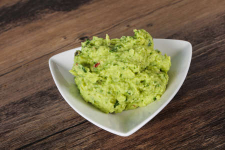 Spicy Avocado guacamole sauce with chili pepperの写真素材