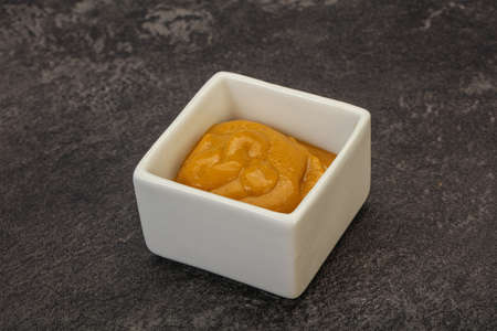 Spicy Mustard sauce in the bowlの写真素材