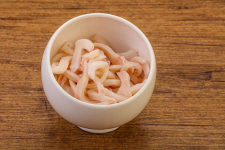 Tasty Marinated squid slices snack in the bowlの写真素材