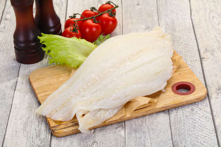 Raw halibut fillet ready for cooking