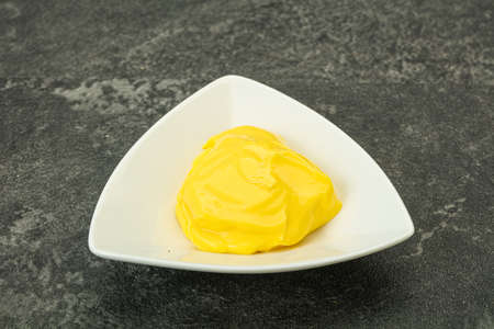 Natural tasty cheese sauce in the bowlの写真素材