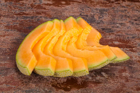 Sliced tasty sweet sliced yellow melonの写真素材