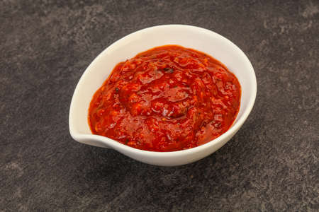 Tomato hot spicy sauce in the bowlの写真素材