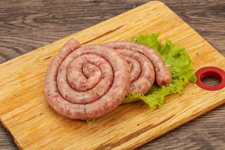 Raw pork sausage ring for grillの写真素材