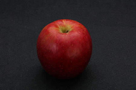 Single Red sweet tasty apple fruitの写真素材