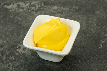 Natural tasty cheese sauce in the bowlの写真素材