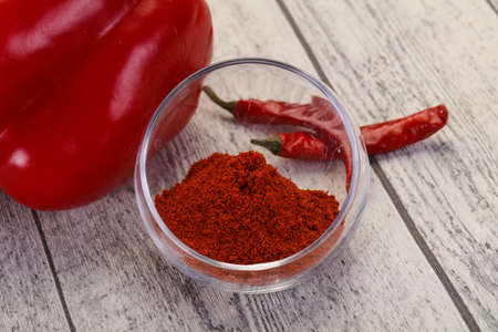Sweet Paprika powder in the bowlの写真素材