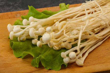 Raw Japanese Enoki mushrooms for cooking