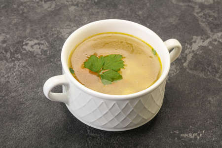 Tasty chicken soup with carrot and potato
