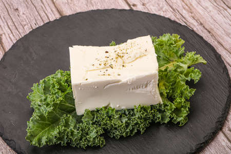 Traditional tasty Greek Feta soft cheese brick